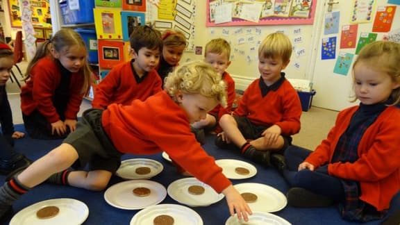 Children at Queen's House take part in a maths investigation morning