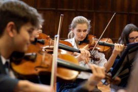 students playing violins